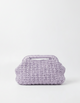 Purple textured pouch on a white background
