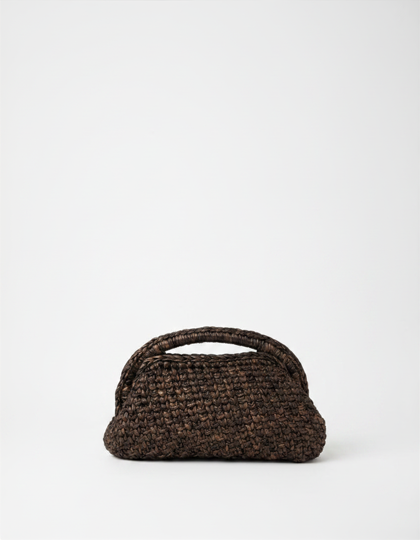 Brown woven handbag on a white background