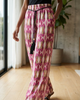 Abstract Wide-Leg Pants in Pink by Paola Pellini