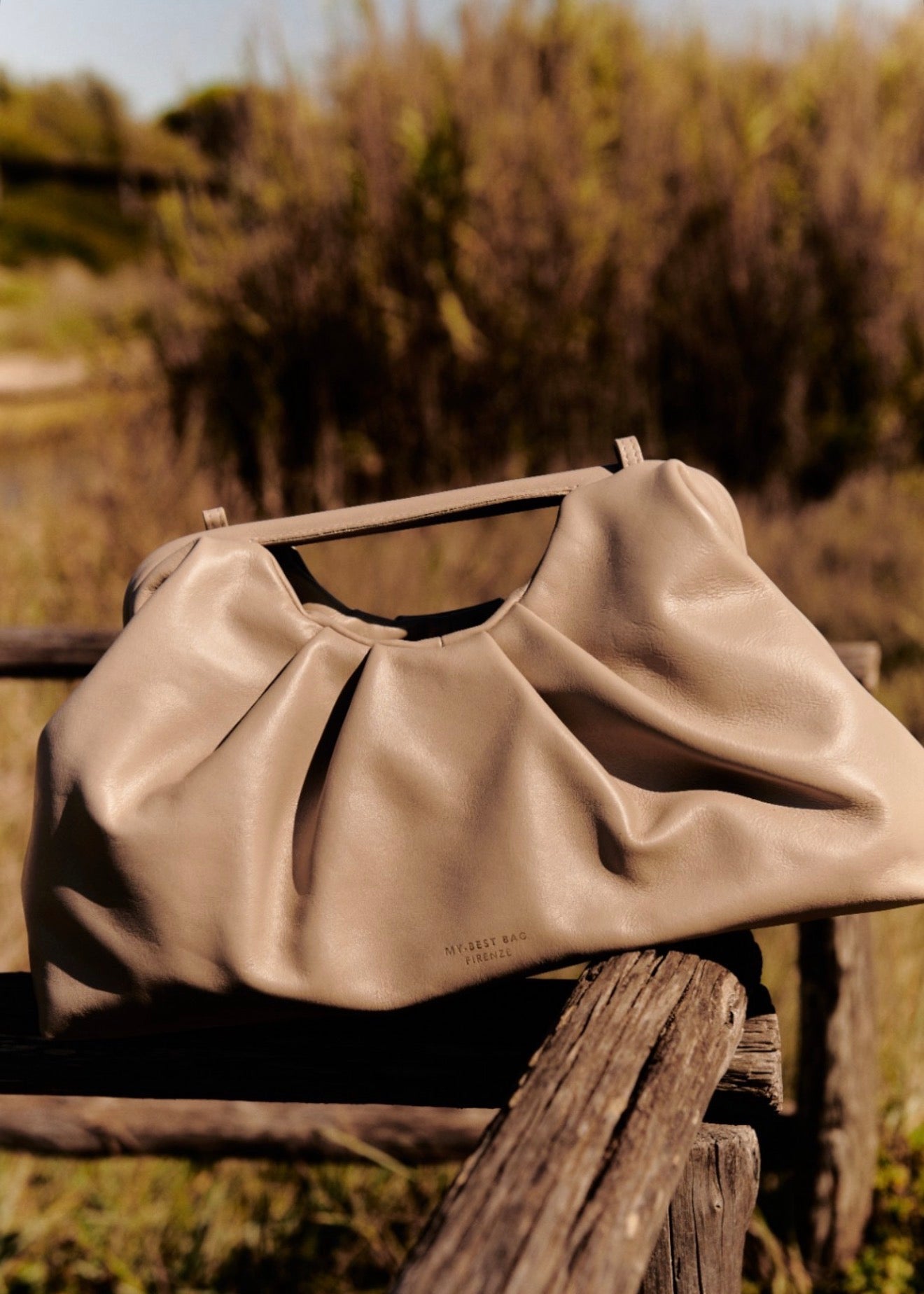 LEATHER CLUTCH IN BEIGE