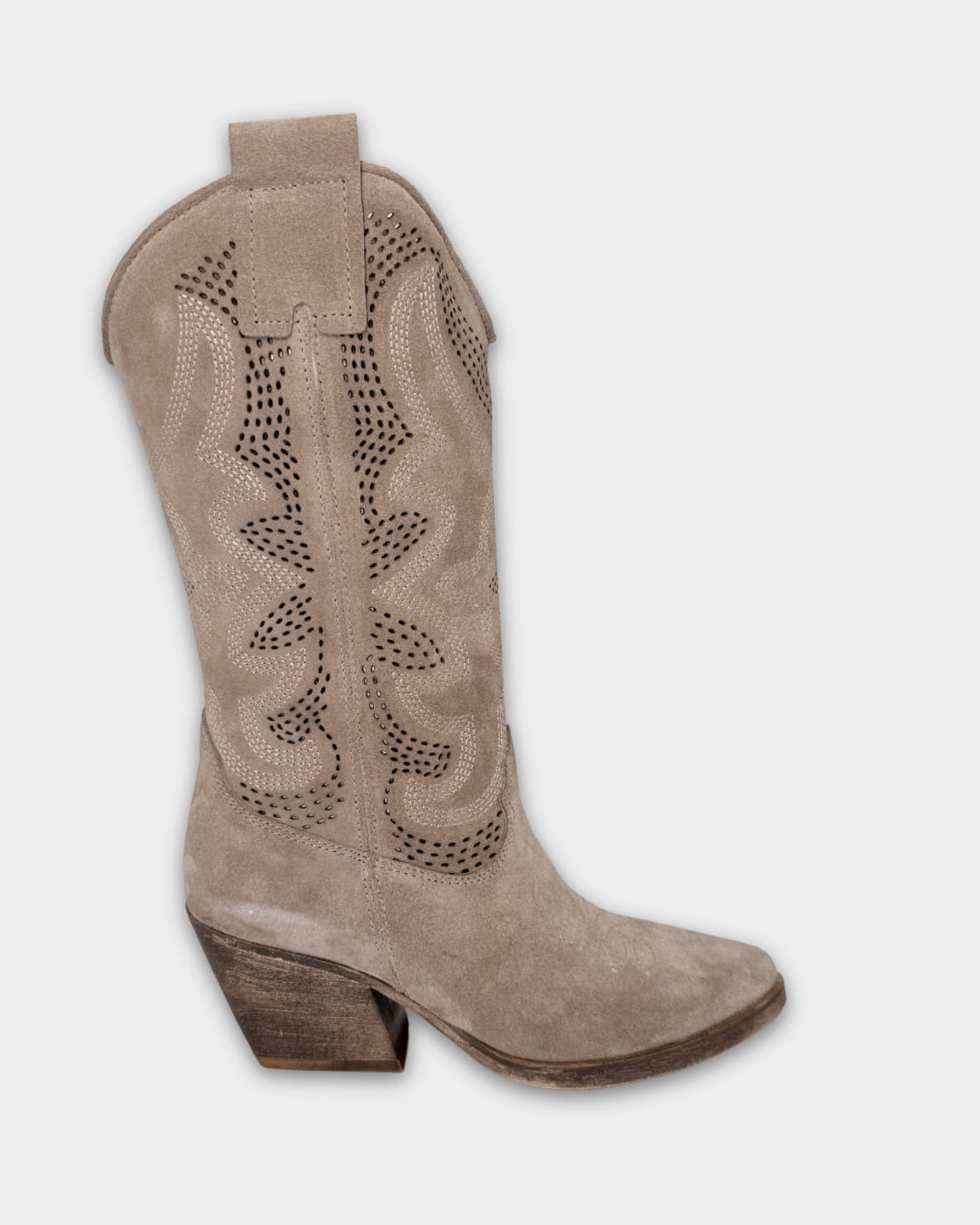Brown cowboy boot with cut-out design on a light gray background