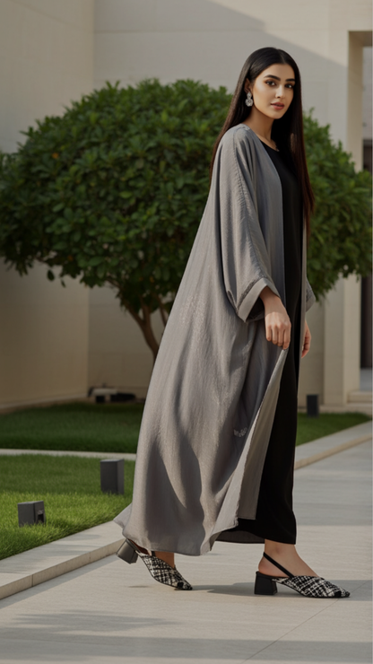 BRAIDED SLING-BACK IN BLACK AND WHITE
